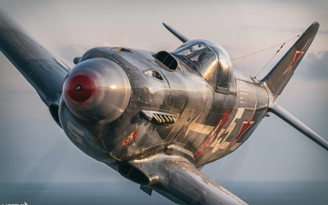 Silver airplane red nose cloudy free wallpaper for desktop - medium preview image