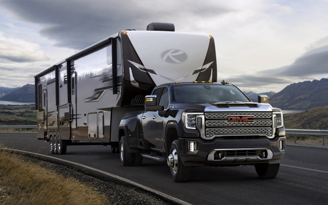 Truck trailer highway mountains clouds free wallpaper for desktop - medium preview image