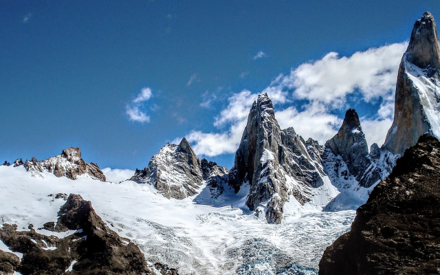 Mountain range snow rocks clouds free wallpaper for desktop - medium preview image