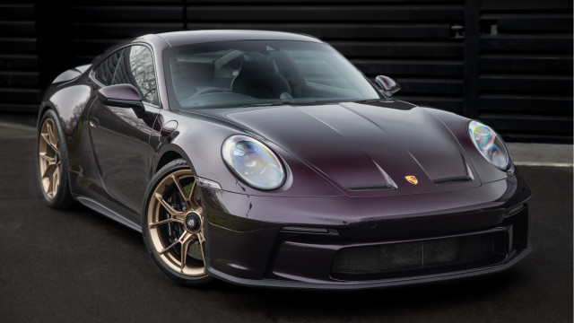 Purple porsche sports car garage free wallpaper for desktop - medium preview image