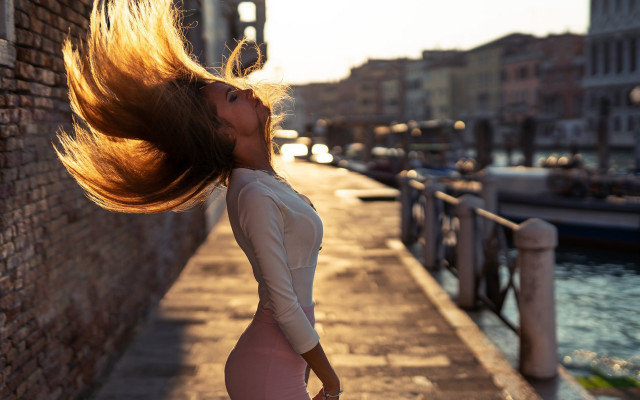 Woman blowing hair river bridge free wallpaper for desktop - medium preview image