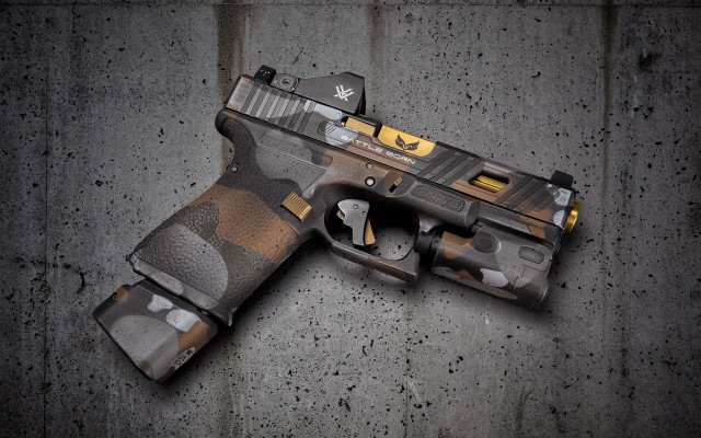 Camouflaged gun concrete yellow light free wallpaper for desktop - medium preview image