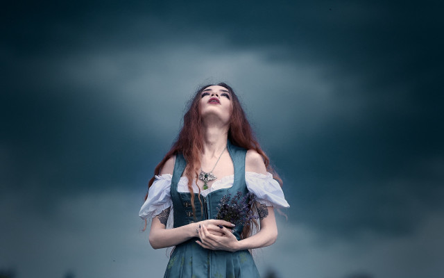 Woman blue dress cloudy sky #2 free wallpaper for desktop - medium preview image