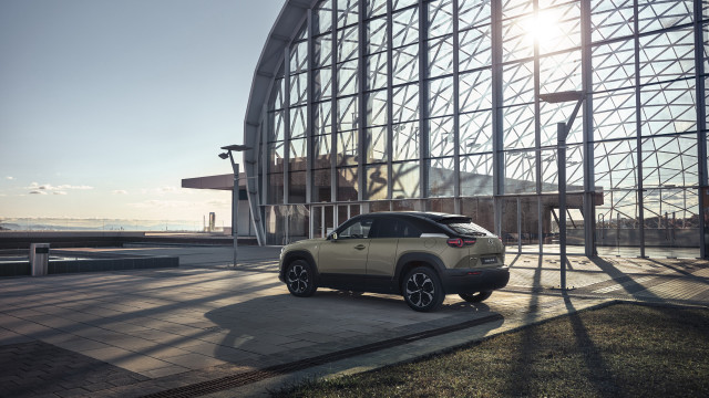 Car building sunshine futurism side free wallpaper for desktop - medium preview image