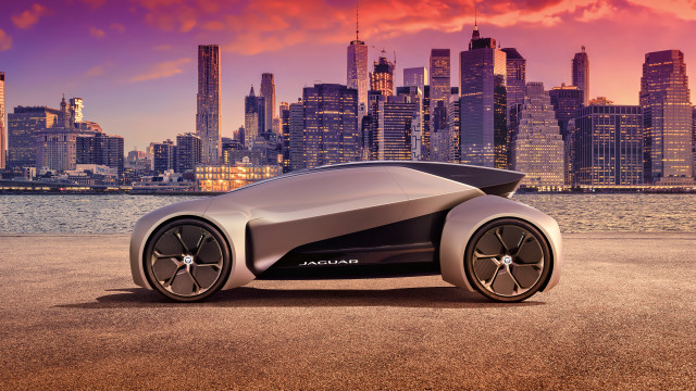 Futuristic car city sunset pink free wallpaper for desktop - medium preview image