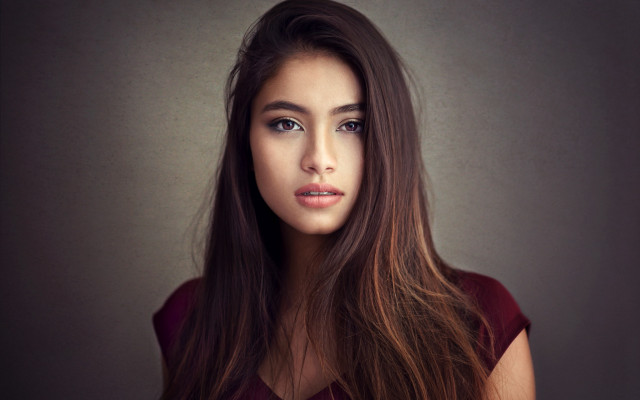 Woman longhair redshirt graybackground characterportrait free wallpaper for desktop - medium preview image