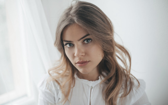 Woman longhair serious blueeyes curtains free wallpaper for desktop - medium preview image