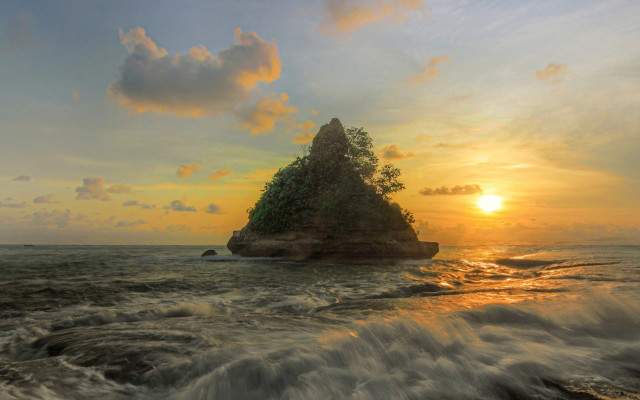 Small island ocean sunset waves free wallpaper for desktop - medium preview image