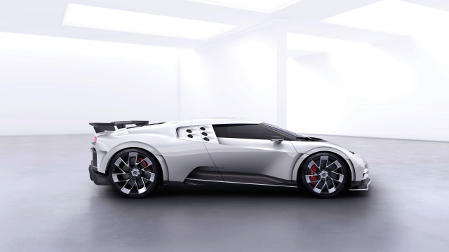 White sports car white room free wallpaper for desktop - medium preview image