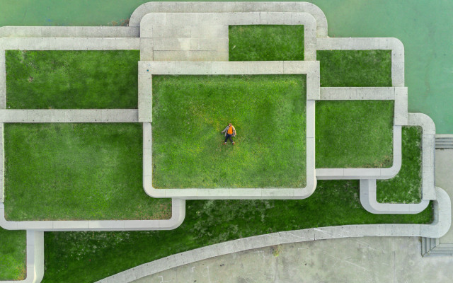 Man walking park green bench free wallpaper for desktop - medium preview image