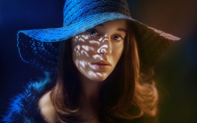 Woman bluehat shadow bluebackground portrait free wallpaper for desktop - medium preview image
