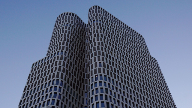 Tall building clock sky modernism free wallpaper for desktop - medium preview image