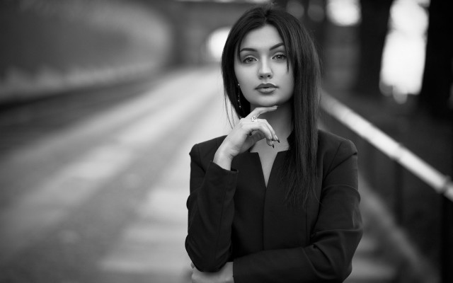 Woman trainstation serious blackandwhite portrait free wallpaper for desktop - medium preview image