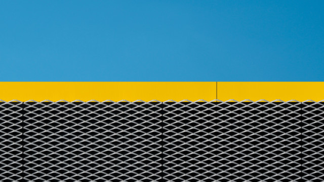 Yellow black building clock blue free wallpaper for desktop - medium preview image