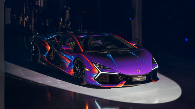 Purple sports car showroom spotlight free wallpaper for desktop - medium preview image