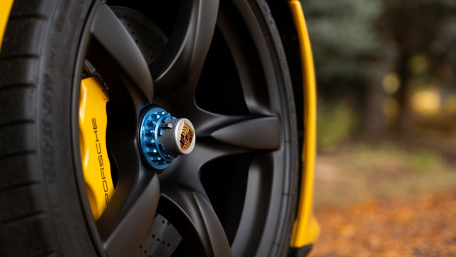 Yellow car tire blue spokes free wallpaper for desktop - medium preview image