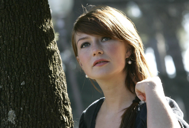 Woman leaning tree hand shoulder free wallpaper for desktop - medium preview image