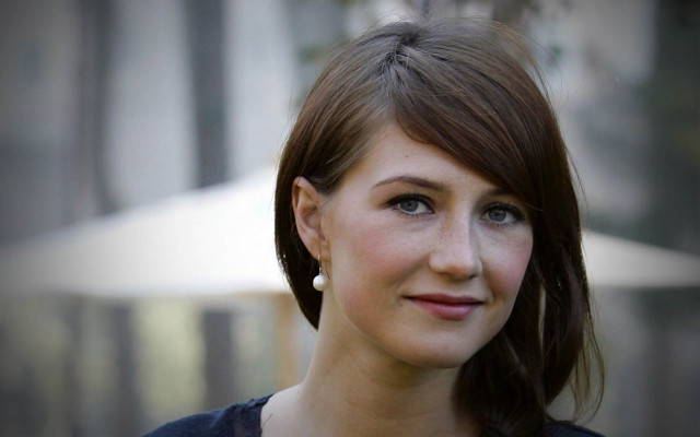 Woman black shirt white necklace free wallpaper for desktop - medium preview image