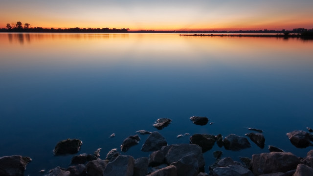 Sunset lake rocks water trees free wallpaper for desktop - medium preview image
