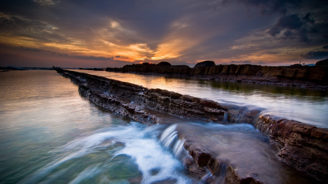 Sunset water rocks boat city free wallpaper for desktop - medium preview image
