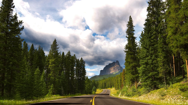 Mountain road trees clouds nature free wallpaper for desktop - medium preview image