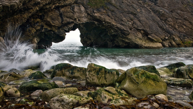 Cave entrance waves rocks outcropping free wallpaper for desktop - medium preview image
