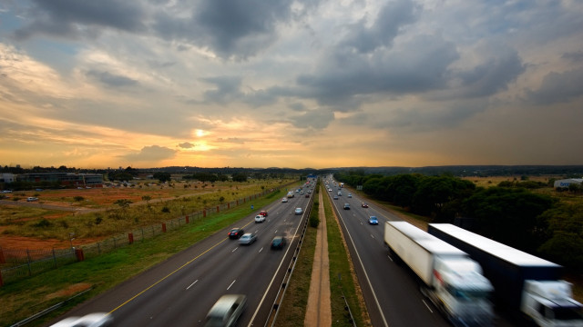 Highway cars sunset cloudy sky free wallpaper for desktop - medium preview image