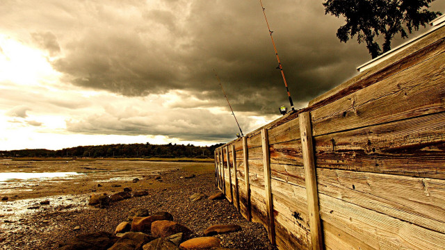Fishing fence water cloudy sky free wallpaper for desktop - medium preview image