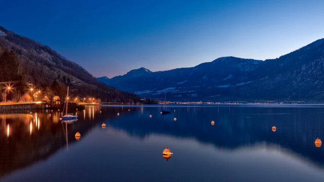 Lake lights mountains night boats free wallpaper for desktop - medium preview image