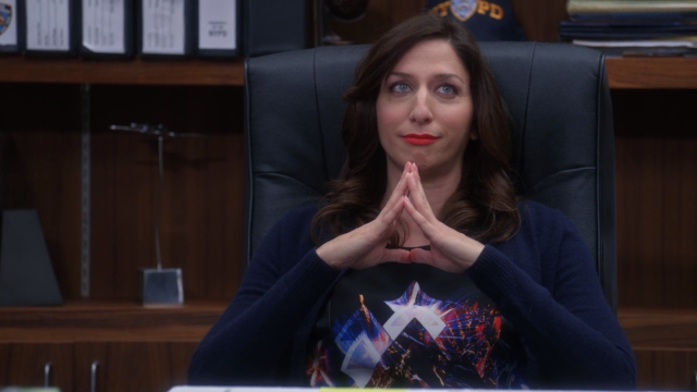 Woman sitting chair hands folded free wallpaper for desktop - medium preview image