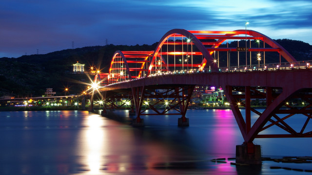 Night lit bridge mountain city free wallpaper for desktop - medium preview image