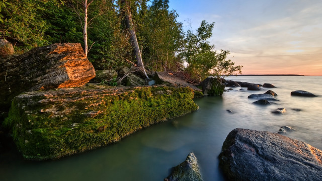 Rocky shore trees water sunset free wallpaper for desktop - medium preview image