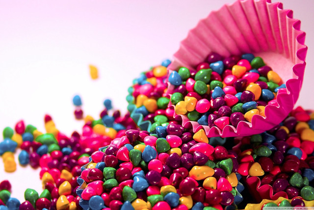 Colorful candy sprinkles white surface free wallpaper for desktop - medium preview image