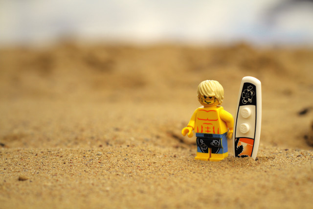 Lego man beach sand surfboard free wallpaper for desktop - medium preview image