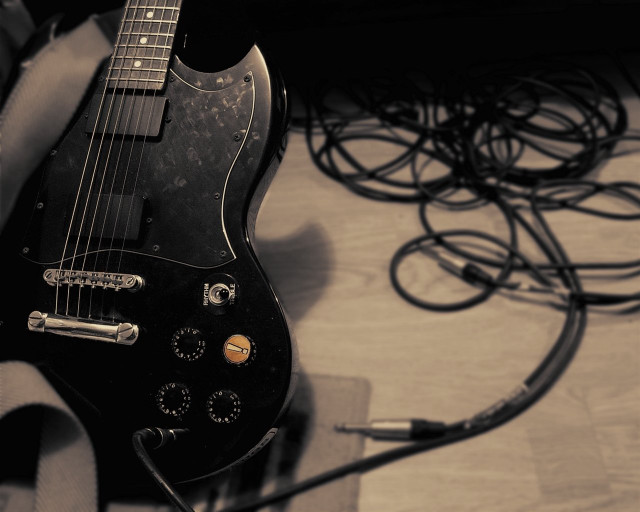 Black guitar wooden floor wires free wallpaper for desktop - medium preview image