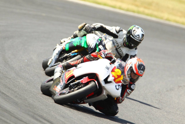 Motorcycle race track grass background free wallpaper for desktop - medium preview image