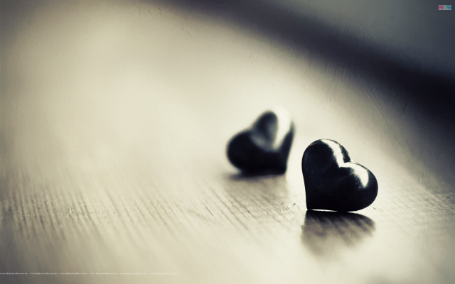 Two hearts table blurry background free wallpaper for desktop - medium preview image