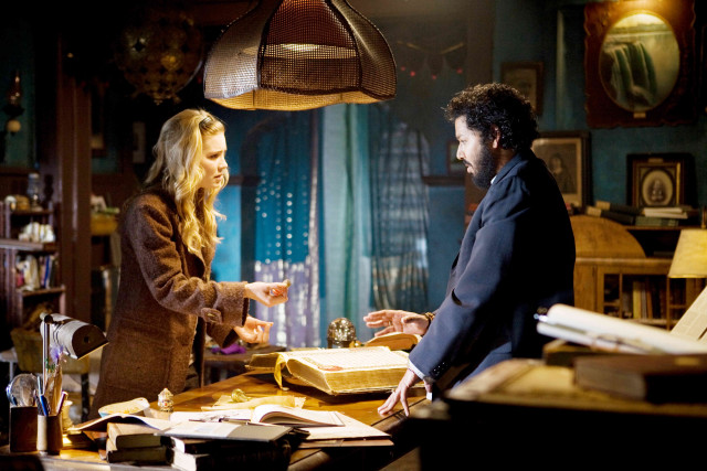 Man woman talking room book free wallpaper for desktop - medium preview image