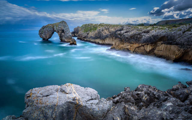 Rocky cliff water rock arch free wallpaper for desktop - medium preview image