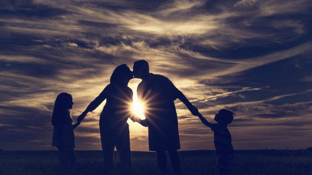 Family holding hands field sunset free wallpaper for desktop - medium preview image