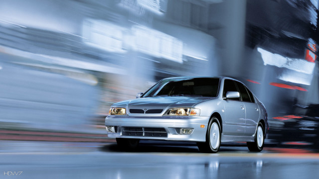 Silver car driving street tall #4 free wallpaper for desktop - medium preview image