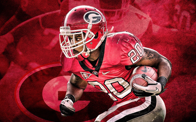 Football player red uniform holding free wallpaper for desktop - medium preview image