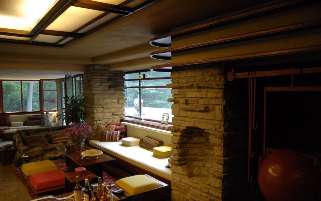 Livingroom stonefireplace largewindow waterview mackintosh free wallpaper for desktop - medium preview image