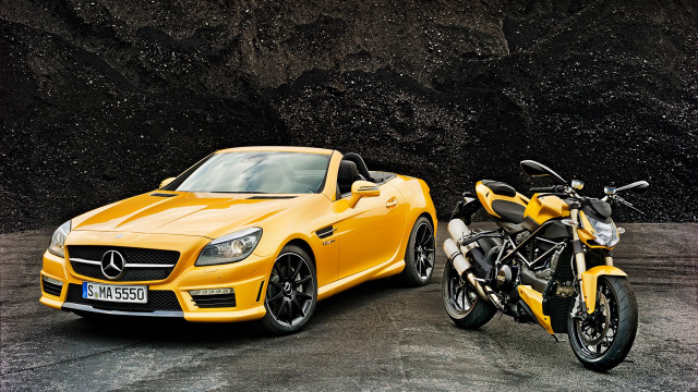 Yellow sportscar motorcycle parking lot free wallpaper for desktop - medium preview image