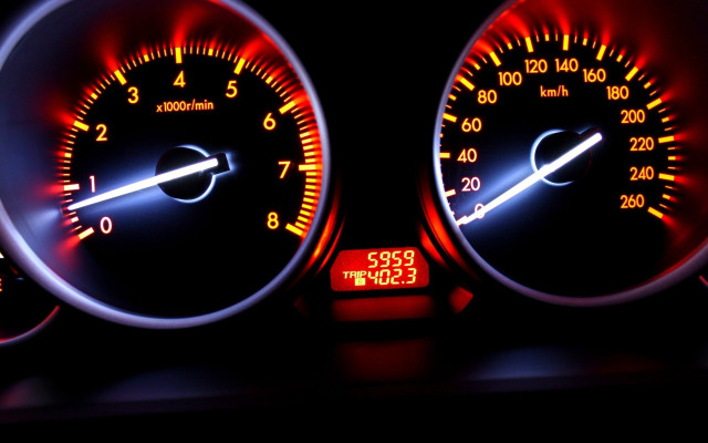 Speedometer closeup red white lights free wallpaper for desktop - medium preview image