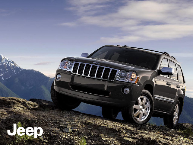 Jeep parked rocky mountain top free wallpaper for desktop - medium preview image