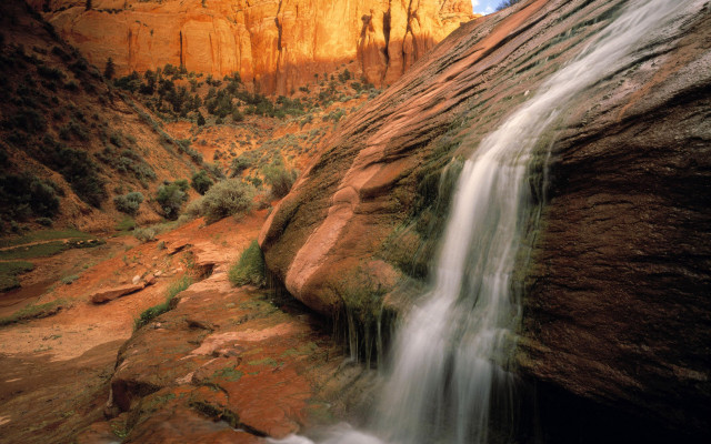 Waterfall desert rocks trees sunset free wallpaper for desktop - medium preview image