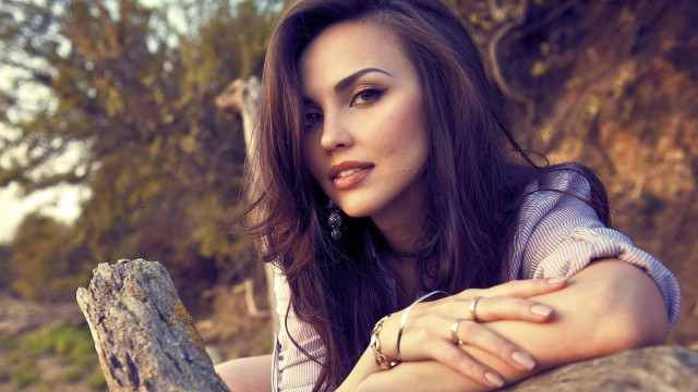 Woman leaning on tree portrait #2 free wallpaper for desktop - medium preview image