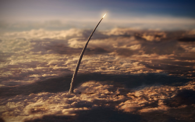 Rocket clouds sky dusk city free wallpaper for desktop - medium preview image