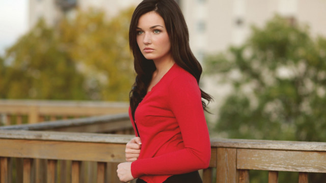 Woman red top bridge portrait free wallpaper for desktop - medium preview image